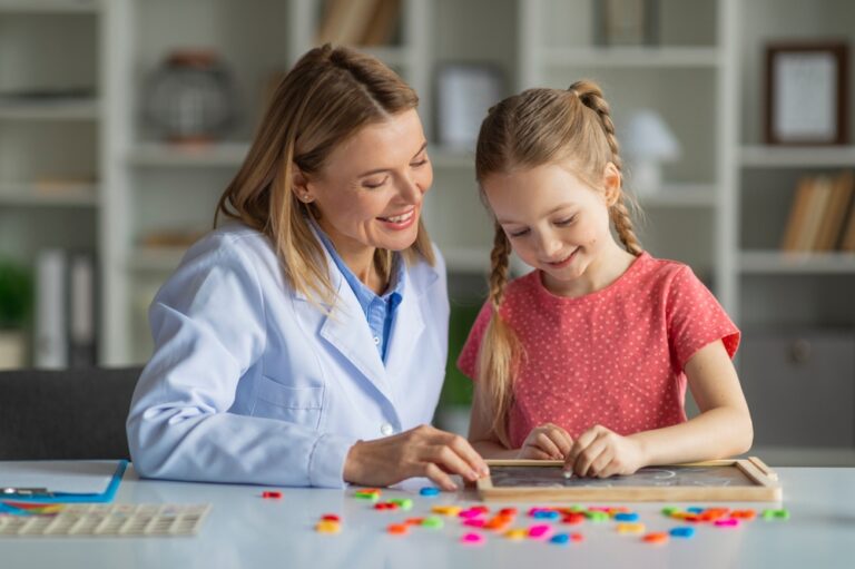 Cute,Little,Girl,Painting,On,Mini,Chalkboard,During,Meeting,With