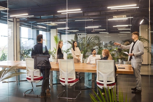 Diverse,Millennial,Business,Team,Briefing,,Talking,In,Modern,Meeting,Room,