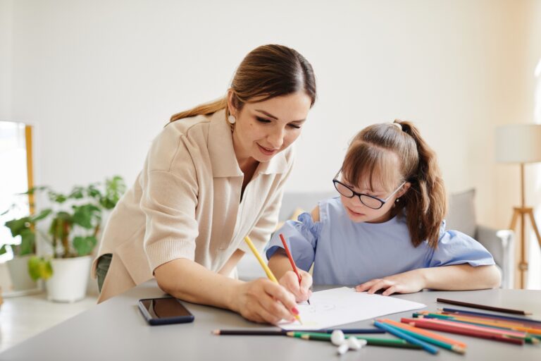 Portrait,Of,Cute,Girl,With,Down,Syndrome,Studying,At,Home